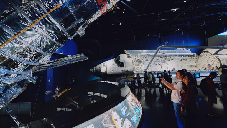 Visitors enjoy immersive multimedia exhibits at the Kennedy Space Center Visitor Complex at Cape Canaveral Visitors enjoy immersive multimedia exhibits at the Kennedy Space Center Visitor Complex at Cape Canaveral