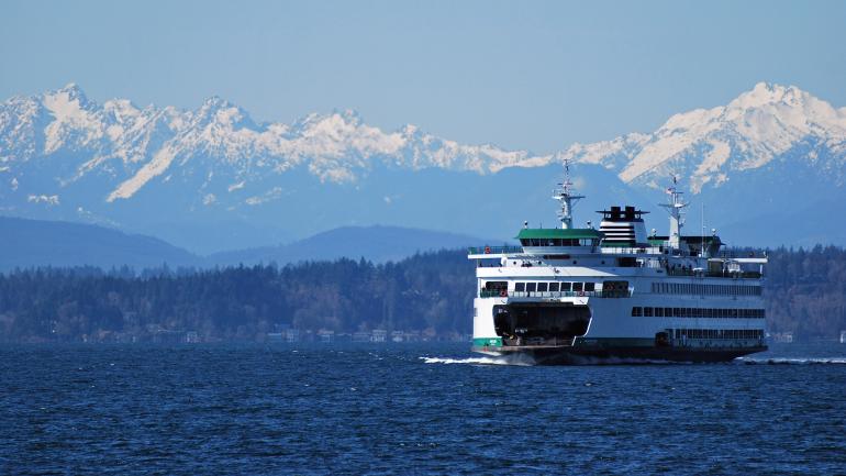 An eco-friendly ferry ride with views of the Olympic Mountains in Washington An eco-friendly ferry ride with views of the Olympic Mountains in Washington