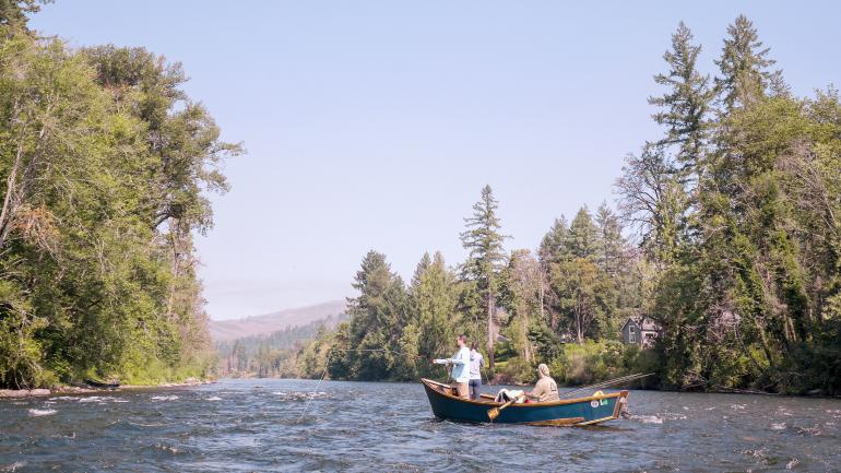 Fly fishing on the McKenzie River near Eugene, Oregon Fly fishing on the McKenzie River near Eugene, Oregon