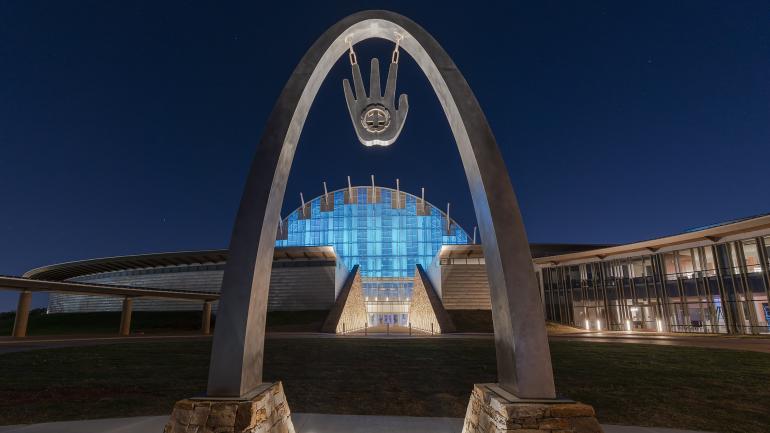 The illuminated exterior of the First Americans Museum in Oklahoma City The illuminated exterior of the First Americans Museum in Oklahoma City
