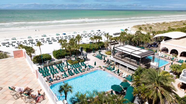 Lounging on the luxurious pool deck of The Don Cesar in St. Petersburg, Florida Lounging on the luxurious pool deck of The Don Cesar in St. Petersburg, Florida