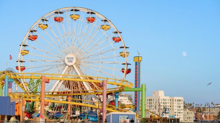 Colorful rides and carnival games along the Santa Monica Pier in California Colorful rides and carnival games along the Santa Monica Pier in California