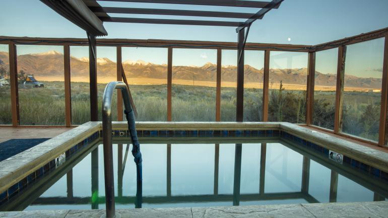 Pool overlooking the Sangre de Cristo mountains at Joyful Journey Hot Springs Spa Pool overlooking the Sangre de Cristo mountains at Joyful Journey Hot Springs Spa