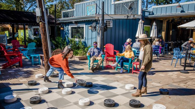 Playing outdoor games at Abita Brew Pub in Abita Springs Playing outdoor games at Abita Brew Pub in Abita Springs