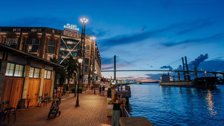Night falls over the Plant Riverside District, a lively entertainment hub in Savannah Night falls over the Plant Riverside District, a lively entertainment hub in Savannah