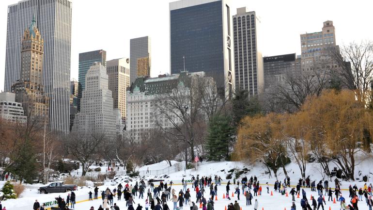 Wollman Rink filled with ice skaters during winter Wollman Rink filled with ice skaters during winter
