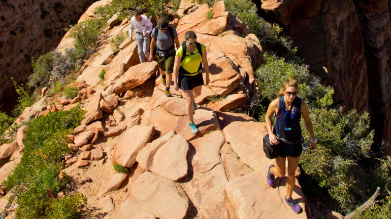 Hiking a narrow ridge toward Angels Landing in Zion National Park, Utah Hiking a narrow ridge toward Angels Landing in Zion National Park, Utah