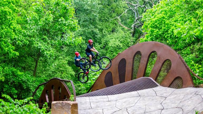 Taking on the jumps of The Masterpiece trail at Crystal Bridges Museum of Art Taking on the jumps of The Masterpiece trail at Crystal Bridges Museum of Art