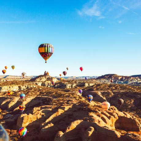 Hot air balloons fill the skies over Red Rock Park in Gallup