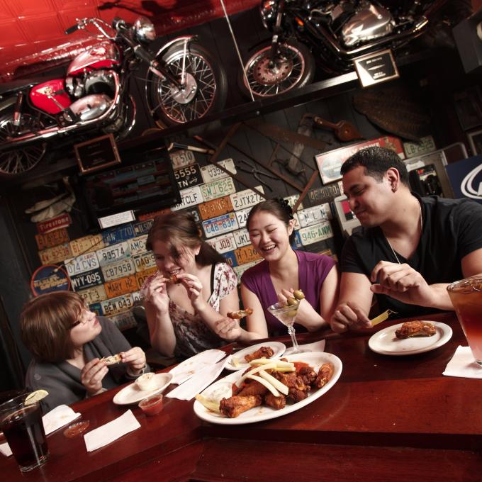 Enjoying chicken wings at Anchor Bar Enjoying chicken wings at Anchor Bar