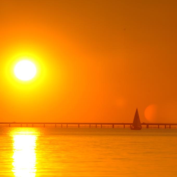 Sunset and the causeway stretching over Lake Pontchartrain Sunset and the causeway stretching over Lake Pontchartrain