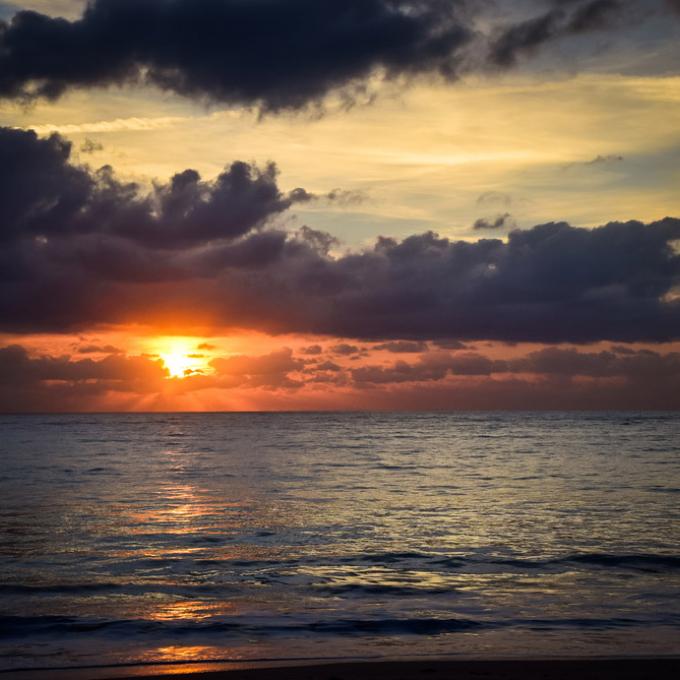 The sun setting on horizon at Vero Beach The sun setting on horizon at Vero Beach