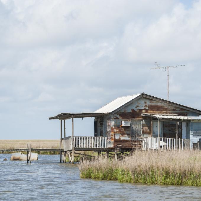 Rustic stilt house in the Houma, Louisiana wetlands Rustic stilt house in the Houma, Louisiana wetlands