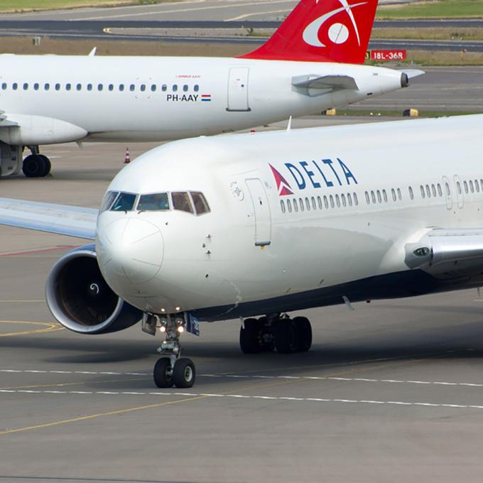A Delta airlines jet on the tarmac A Delta airlines jet on the tarmac