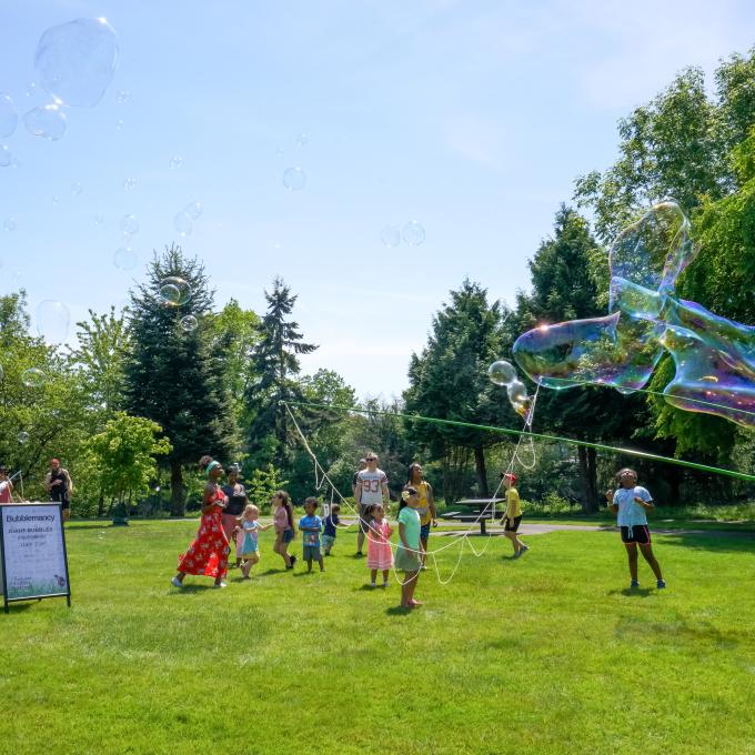Children playing during the Backyard Wildlife Festival in Tukwila, Washington Children playing during the Backyard Wildlife Festival in Tukwila, Washington