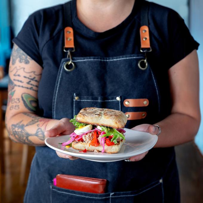 Serving up a specialty sandwich at Winna’s Kitchen in Myrtle Beach, South Carolina Serving up a specialty sandwich at Winna’s Kitchen in Myrtle Beach, South Carolina