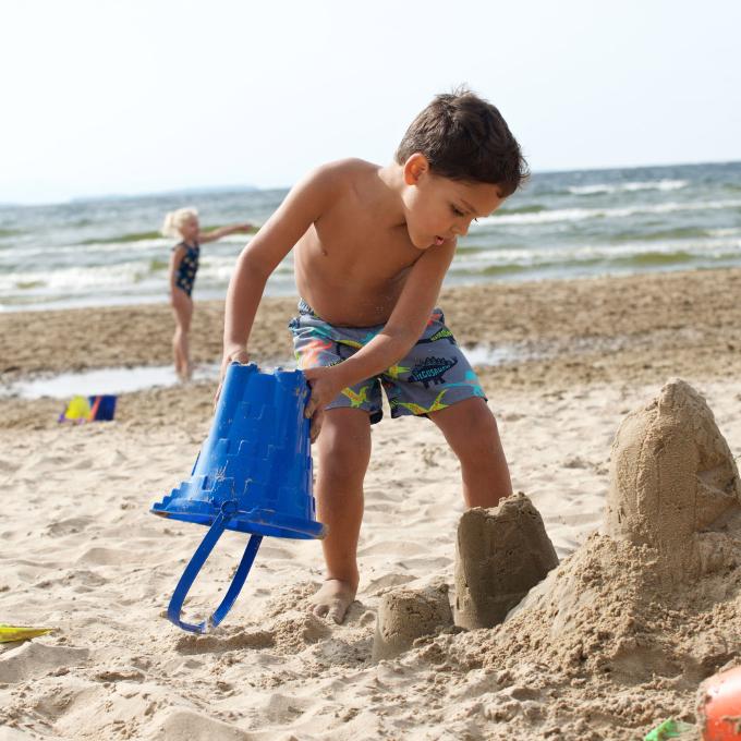 Playing in the sand at Plattsburgh City Beach in Plattsburgh, New York Playing in the sand at Plattsburgh City Beach in Plattsburgh, New York