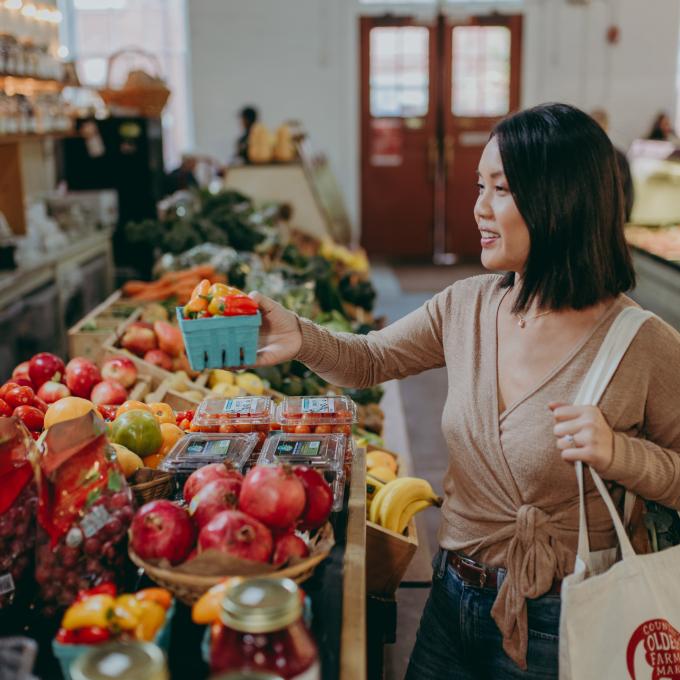 Selecting fresh local produce at the Lancaster Central Market in Lancaster, Pennsylvania Selecting fresh local produce at the Lancaster Central Market in Lancaster, Pennsylvania