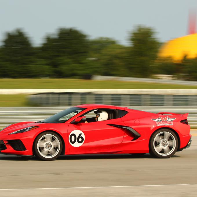 A Corvette speeds around the track at NCM Motorsports Park in Bowling Green, Kentucky A Corvette speeds around the track at NCM Motorsports Park in Bowling Green, Kentucky