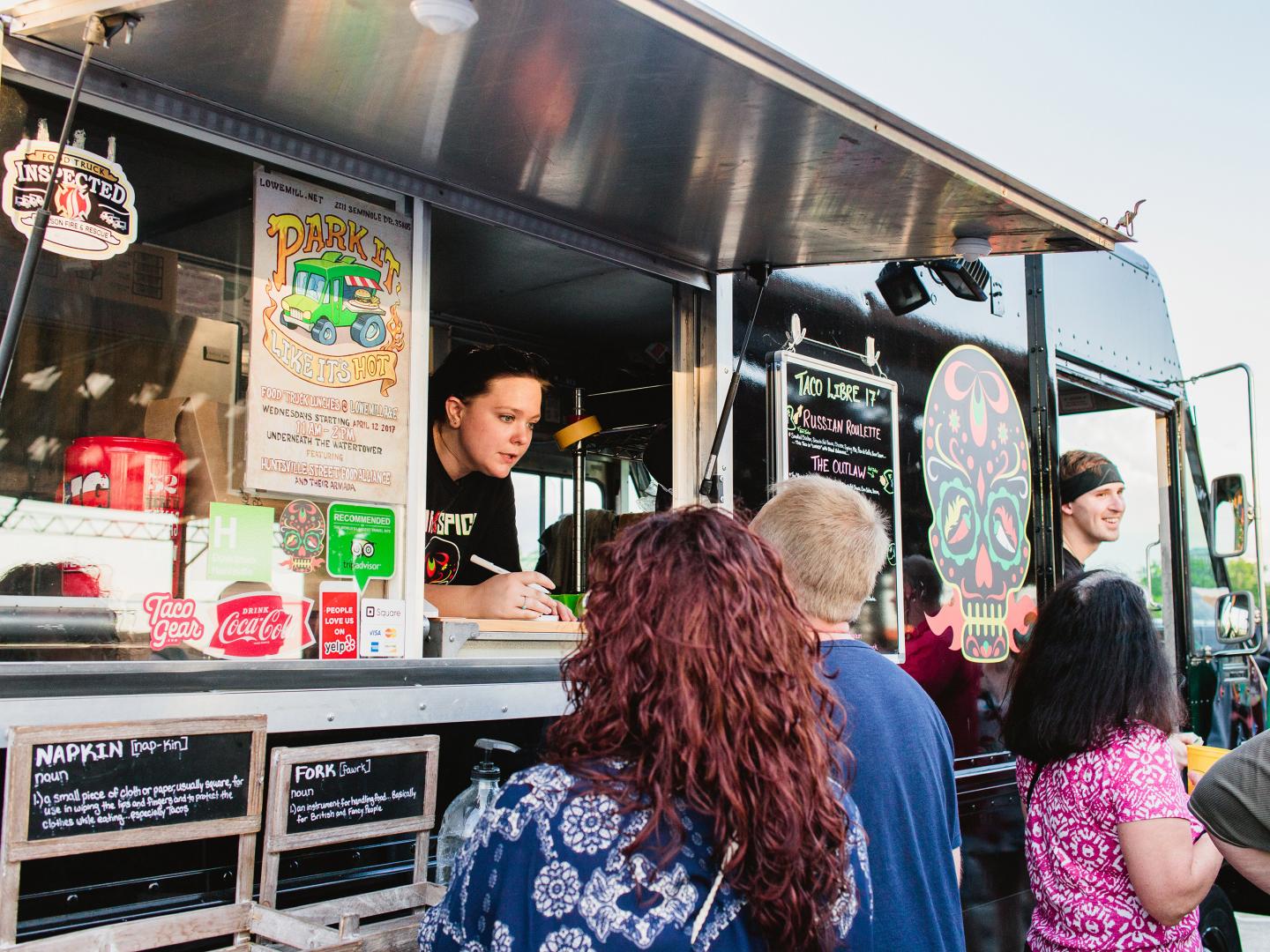 Ordering tacos from a food truck during the Taco Libre event in Montgomery, Alabama Ordering tacos from a food truck during the Taco Libre event in Montgomery, Alabama