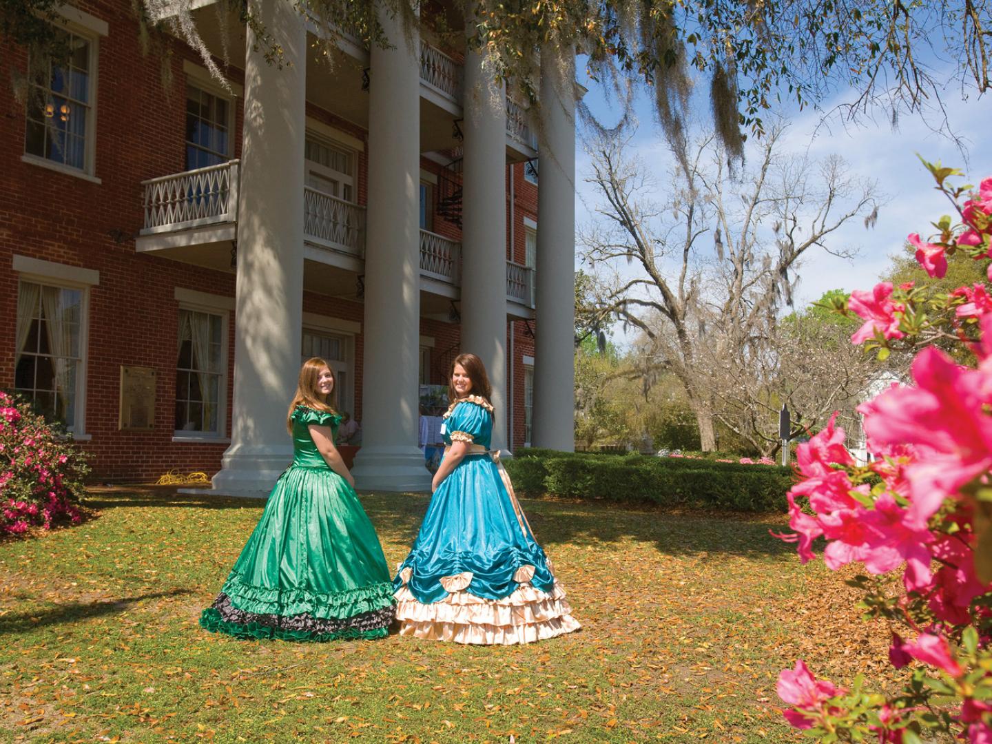 Re-enactors dressed in period costume during the Selma Pilgrimage tour of historic homes in Alabama Re-enactors dressed in period costume during the Selma Pilgrimage tour of historic homes in Alabama