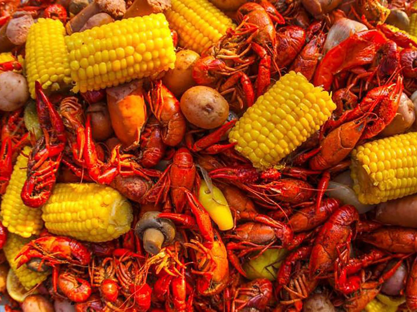A pile of boiled crawfish and sides during the Central Alabama Crawfish Festival A pile of boiled crawfish and sides during the Central Alabama Crawfish Festival