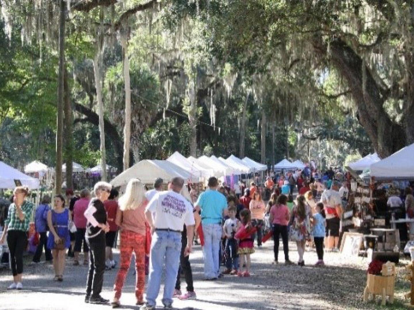 Festival goers at the McIntosh 1890s Festival in Ocala, Florida Festival goers at the McIntosh 1890s Festival in Ocala, Florida