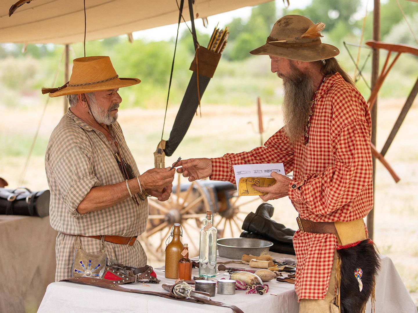 Reenactors participate in the 1838 Mountain Man Rendezvous in Riverton, Wyoming Reenactors participate in the 1838 Mountain Man Rendezvous in Riverton, Wyoming