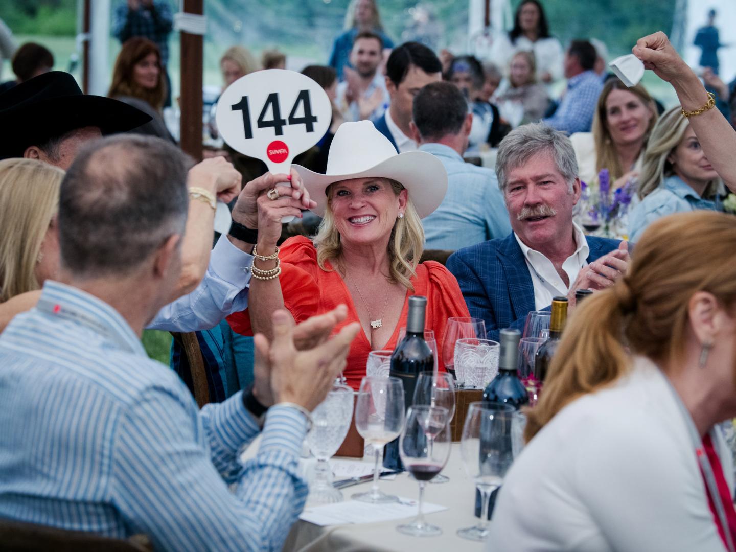 Placing bids at the annual Sun Valley Wine Auction in Ketchum, Idaho Placing bids at the annual Sun Valley Wine Auction in Ketchum, Idaho