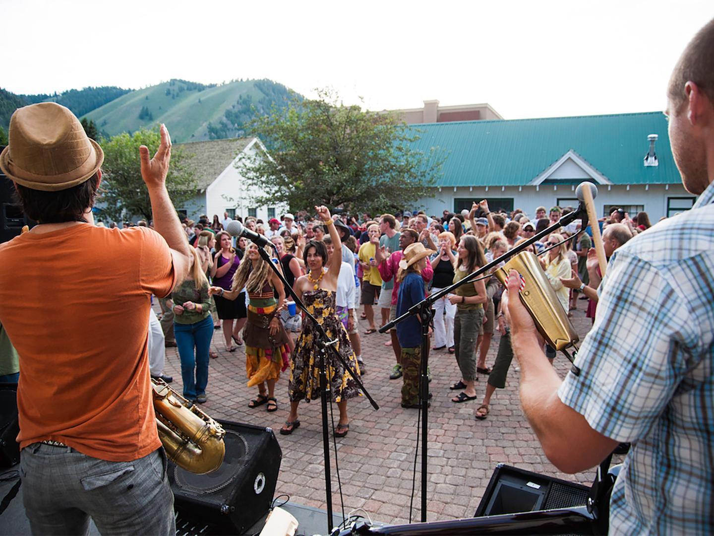 A band performs for a crowd in downtown Ketchem, Idaho, during the annal Ketch’em Alive concert series A band performs for a crowd in downtown Ketchem, Idaho, during the annal Ketch’em Alive concert series