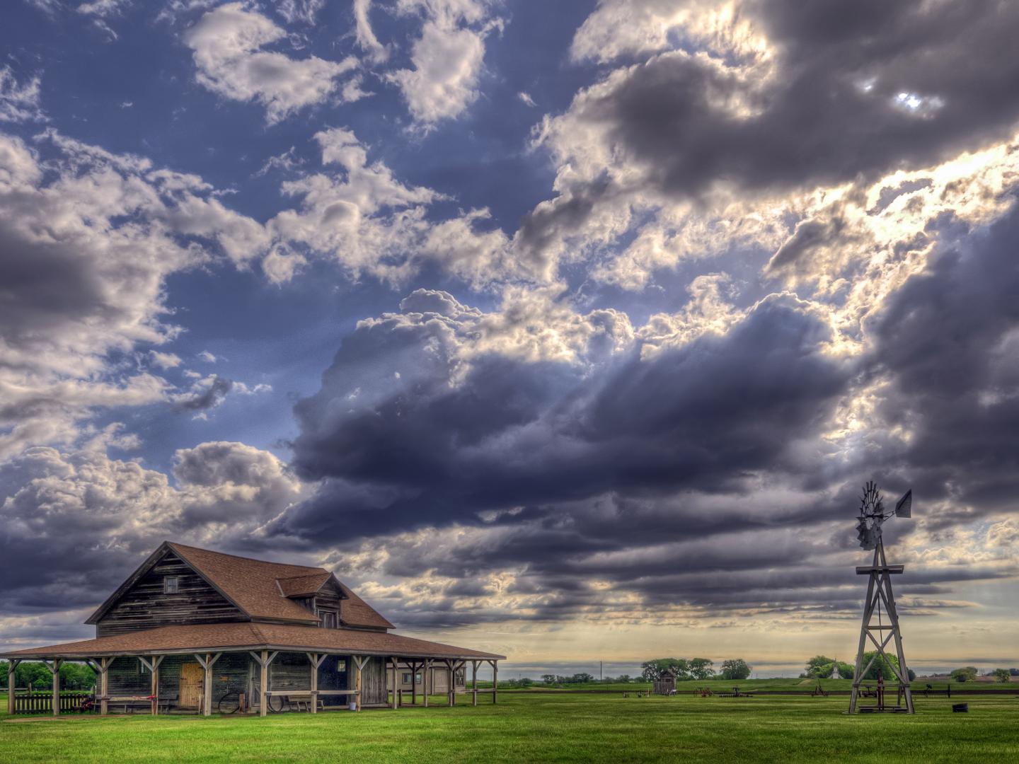 The Laura Ingalls Wilder homestead under a dramatic sky The Laura Ingalls Wilder homestead under a dramatic sky