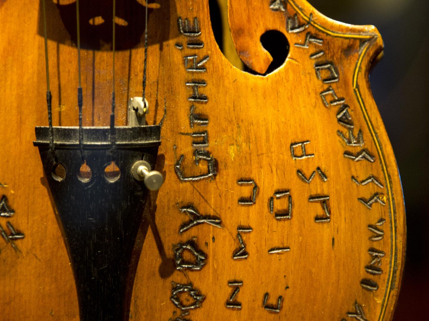 Guitar on display at the Woody Guthrie Center in Tulsa Guitar on display at the Woody Guthrie Center in Tulsa