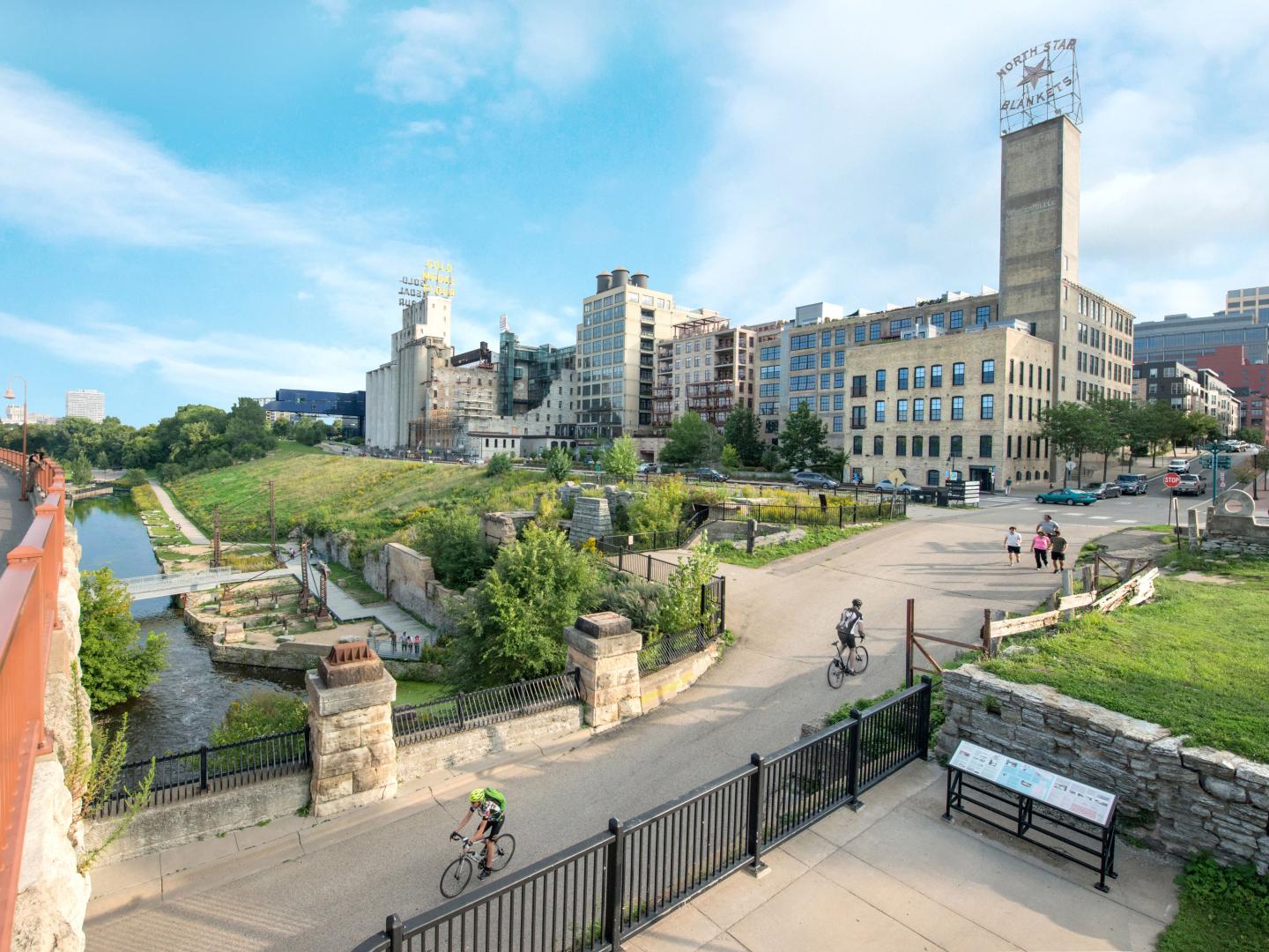 The Stone Arch Bridge in the Mill City District along the Minneapolis, Minnesota riverfront The Stone Arch Bridge in the Mill City District along the Minneapolis, Minnesota riverfront