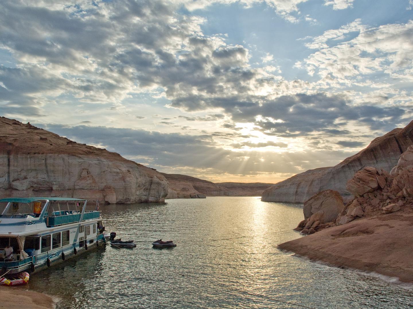 A houseboat on Lake Powell in Glen Canyon National Recreation Area in Utah A houseboat on Lake Powell in Glen Canyon National Recreation Area in Utah