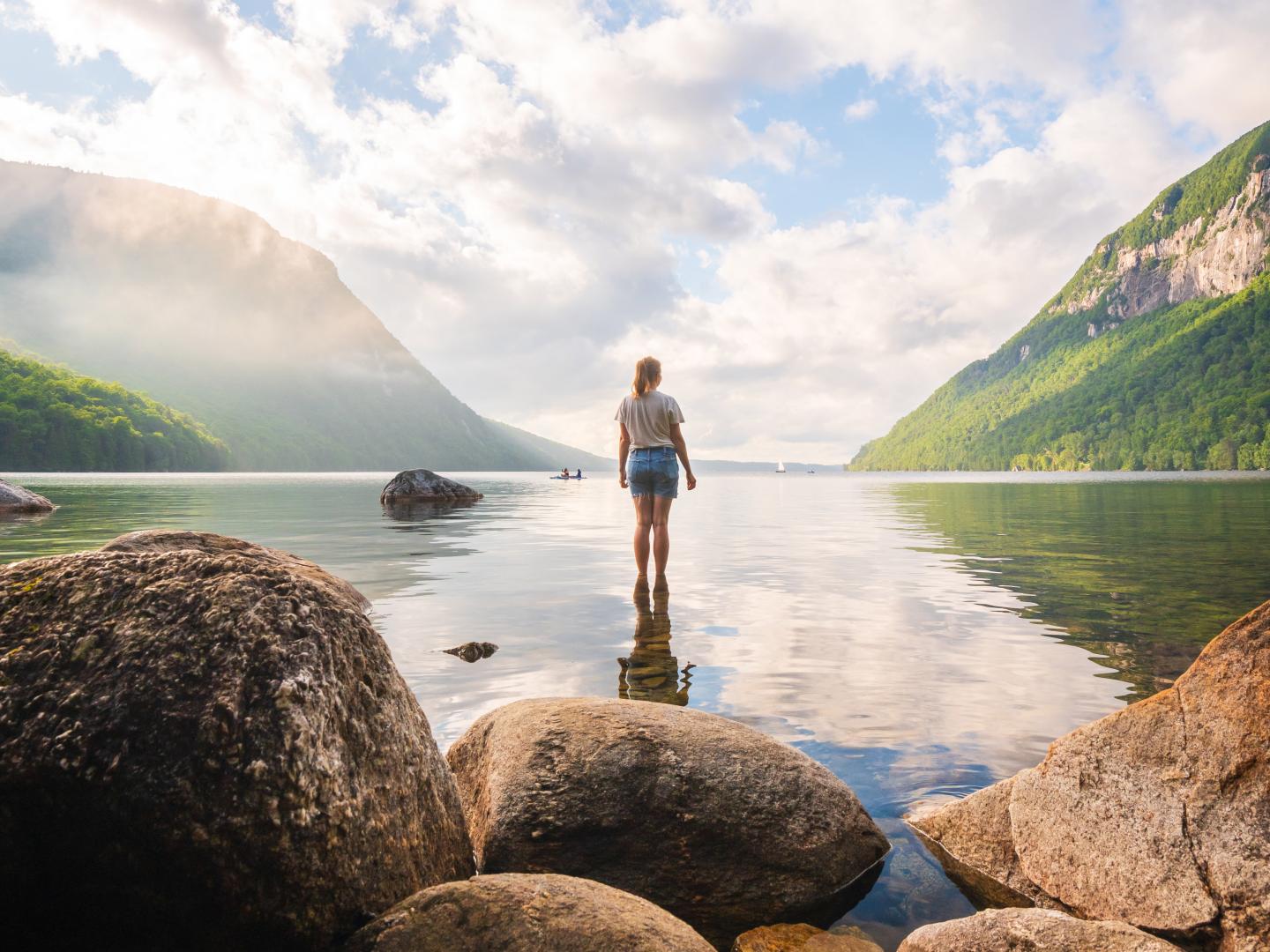 Wading in the calm waters of Lake Willoughby, Vermont Wading in the calm waters of Lake Willoughby, Vermont