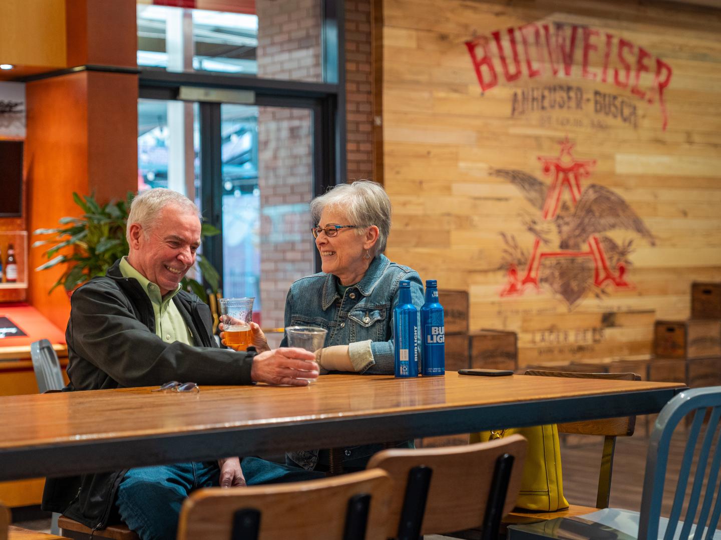 Couple enjoying beers at the Anheuser-Busch Brewery in St. Louis, Missouri Couple enjoying beers at the Anheuser-Busch Brewery in St. Louis, Missouri