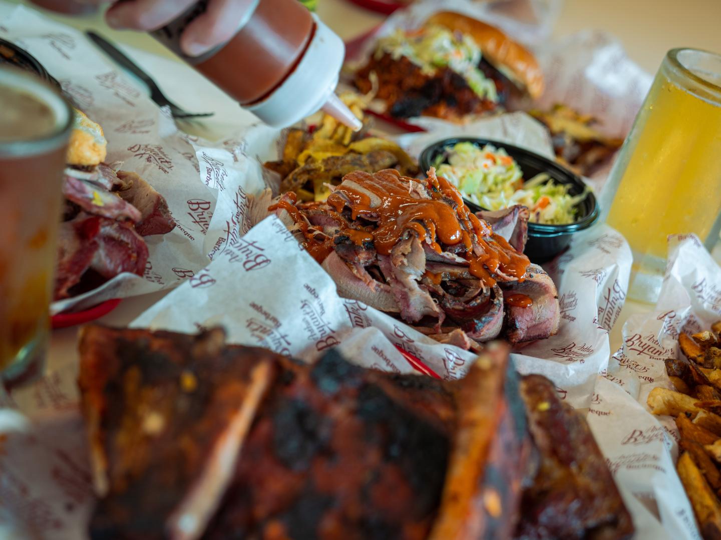 A sampling of smoked meats plus sides and drinks at Arthur Bryant’s Barbeque in Kansas City, Missouri A sampling of smoked meats plus sides and drinks at Arthur Bryant’s Barbeque in Kansas City, Missouri