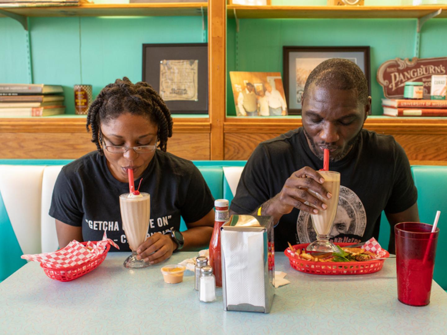 Enjoying milkshakes and classic diner food at Brent’s Drugs soda fountain in Jackson, Mississippi Enjoying milkshakes and classic diner food at Brent’s Drugs soda fountain in Jackson, Mississippi