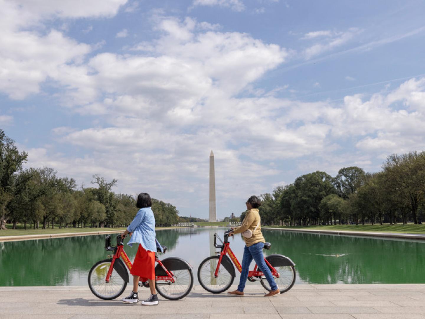 Biking along the Lincoln Memorial Reflecting Pool in Washington, D.C. Biking along the Lincoln Memorial Reflecting Pool in Washington, D.C.