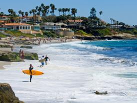 A classic California surfing scene along the San Diego coast