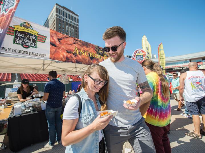 Enjoying chicken wings at the Buffalo Wing Festival