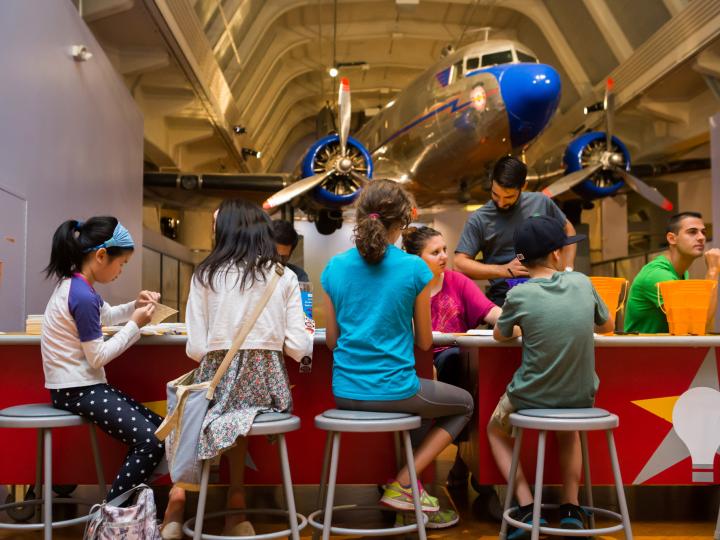 Children tinkering to create projects at The Henry Ford’s Maker Faire Children tinkering to create projects at The Henry Ford’s Maker Faire