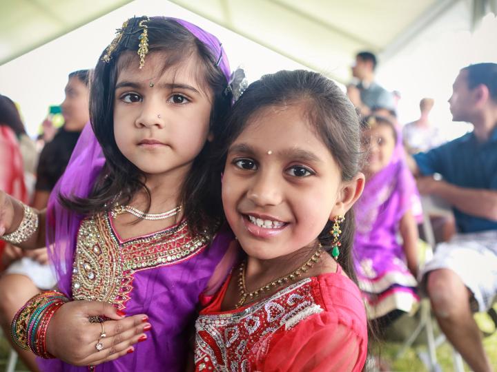 Children attending the Gilbert Global Village Festival in traditional dress Children attending the Gilbert Global Village Festival in traditional dress