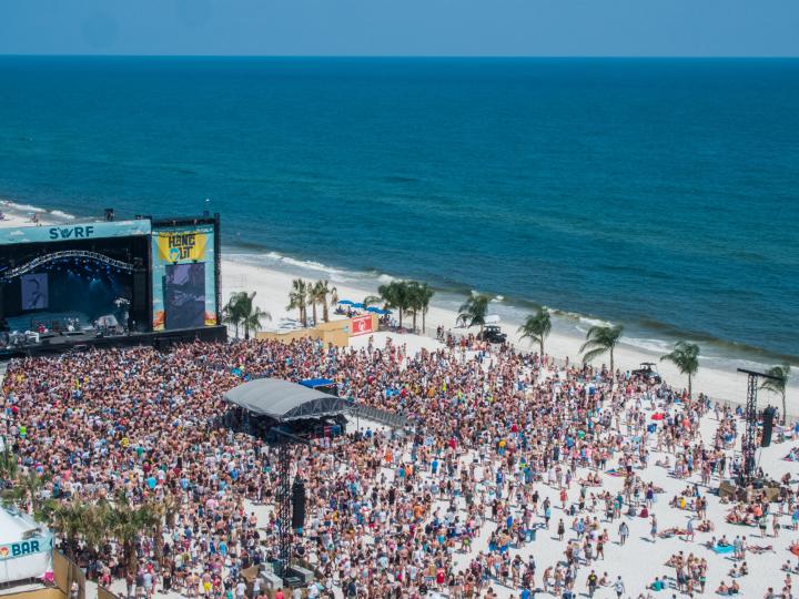 Watching live bands on the beach during the Hangout Music Festival in Gulf Shores, Alabama Watching live bands on the beach during the Hangout Music Festival in Gulf Shores, Alabama