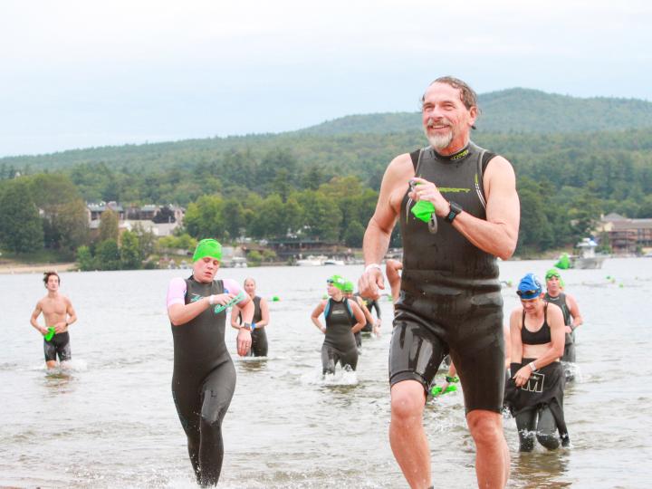 Athletes compete in the Lake George Triathlon Festival in Lake George, New York Athletes compete in the Lake George Triathlon Festival in Lake George, New York
