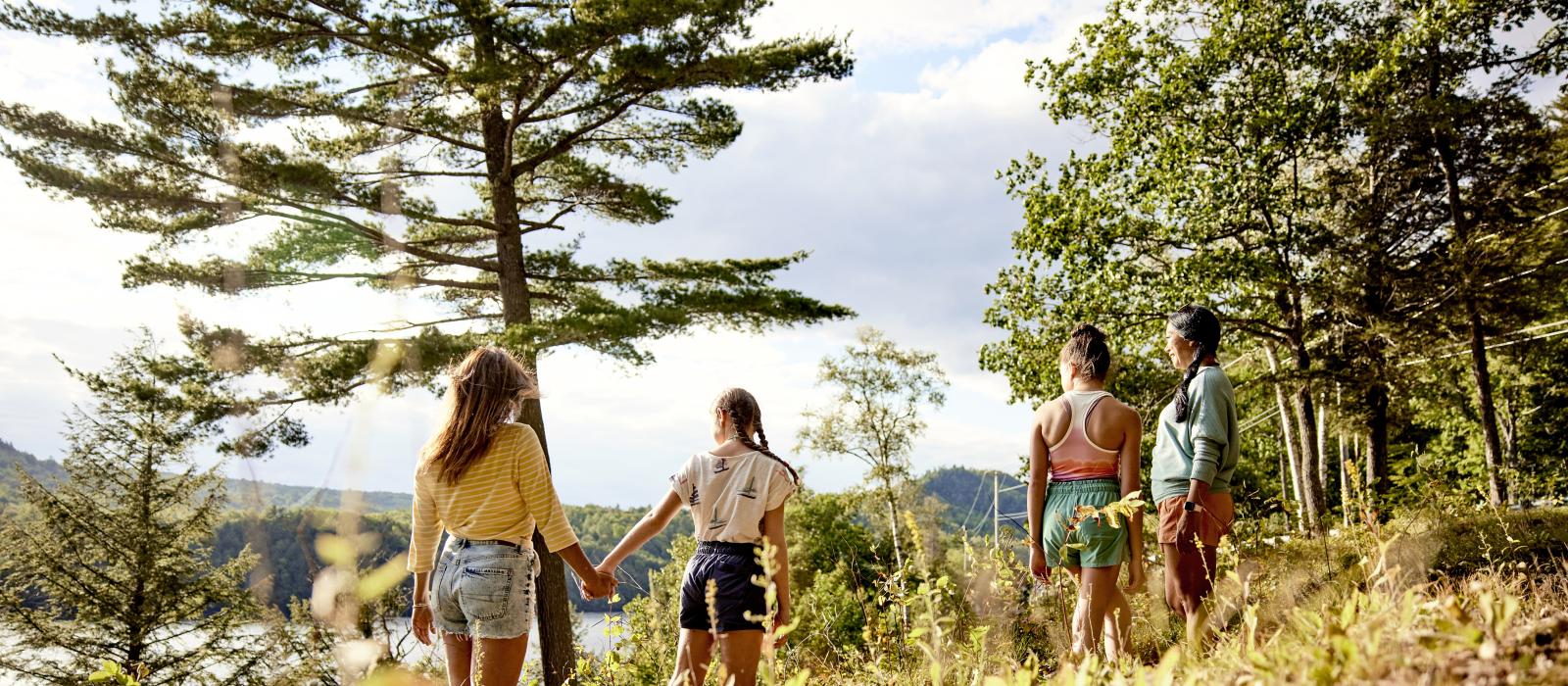 A group of hikers appreciating the great outdoors in The Forks, Maine A group of hikers appreciating the great outdoors in The Forks, Maine