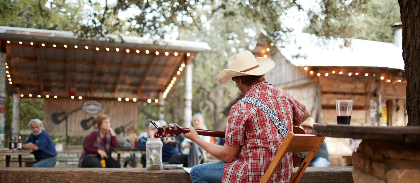 Playing an intimate backyard country concert in San Antonio, Texas Playing an intimate backyard country concert in San Antonio, Texas
