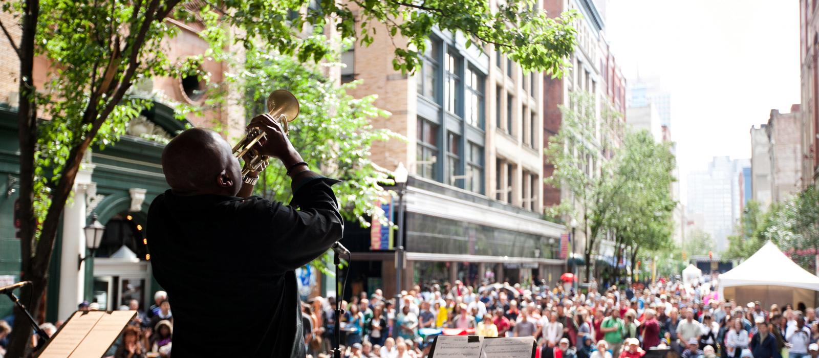 A jazz musician playing at the Pittsburgh International Jazz Festival in Pennsylvania A jazz musician playing at the Pittsburgh International Jazz Festival in Pennsylvania