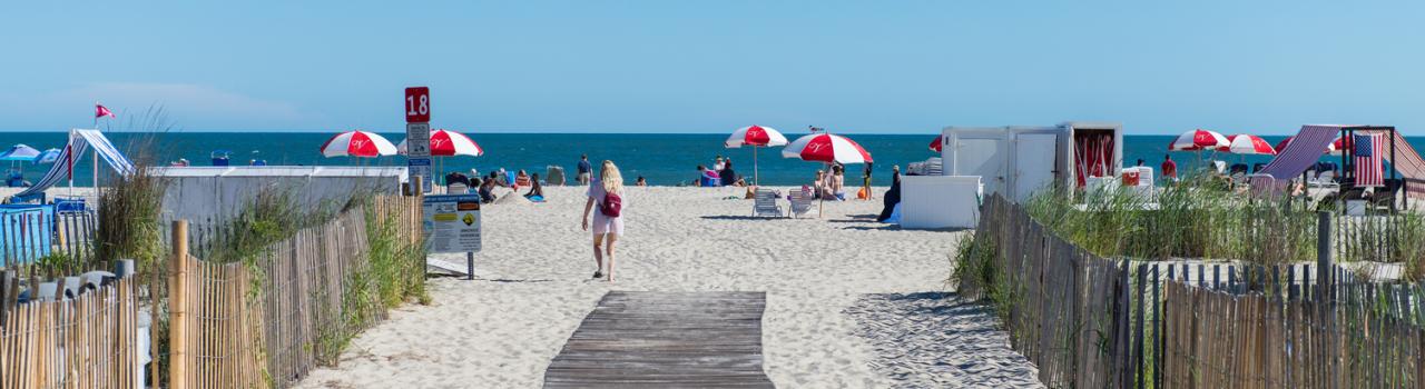 A boardwalk to the beach in Cape May, New Jersey A boardwalk to the beach in Cape May, New Jersey