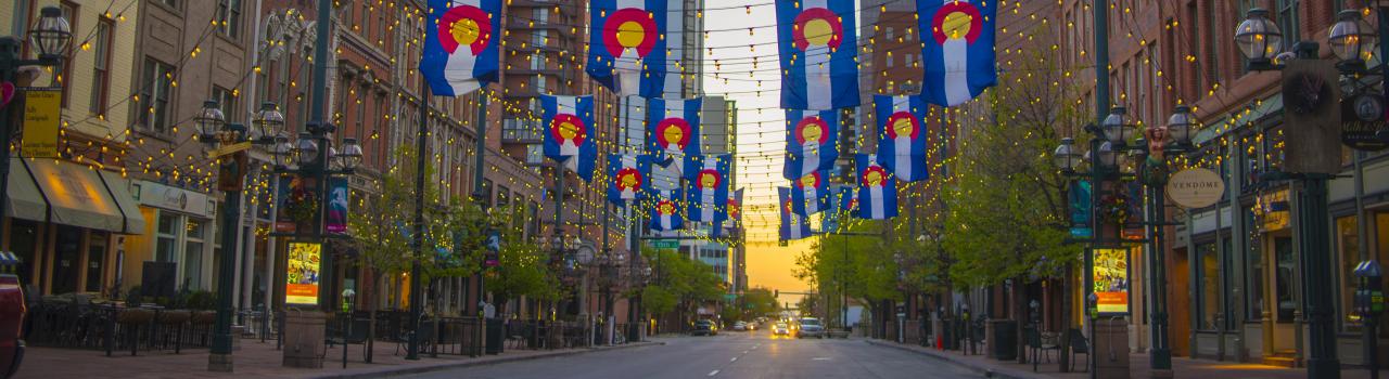 Colorado state flags hung over Larimer Square in Denver Colorado state flags hung over Larimer Square in Denver